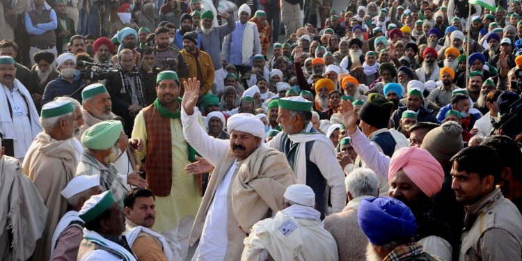 Bharatiya Kisan Union (BKU) National President Naresh Tikait along with other Khap leaders during farmers protest against the Centers new farm law at Ghazipur border, in Ghaziabad, Thursday, Dec. 17, 2020.