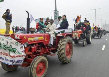 File photo of farmers holding a tractor rally during their ongoing protest against the new farm laws at Ghazipur near New Delhi (Photo Credit: PTI)