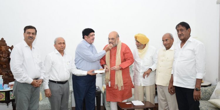 Amit Shah meets cooperative society leaders July 10, 2021. (Image: Twitter/ @AmitShah)