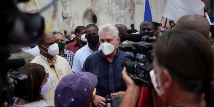 Cuban President Miguel Díaz-Canel in San Antonio de los Baños, Cuba, July 11. (Alexandre Meneghini/Reuters)