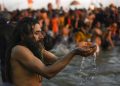 Allahabad: A Sadhu takes a holy dip at Sangam on the auspicious Makar Sankranti day during the Kumbh Mela, or pitcher festival, in Allahabad (Prayagraj), Tuesday, Jan. 15, 2019. (PTI Photo/Ravi Choudhary)(PTI1_15_2019_000078B)