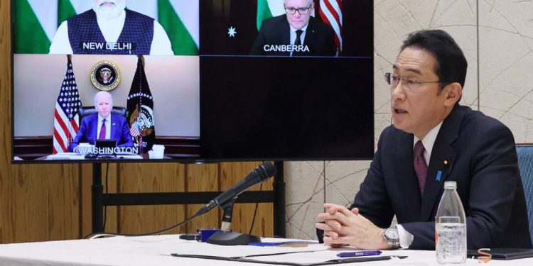 Japanese Prime Minister Fumio Kishida attends the Quad online meeting at Prime Minister’s Office in Tokyo with (on screen) Prime Minister Narendra Modi, U.S. president Joe Biden and Australia’s Prime Minister Scott Morrison March 3, 2022. (File Photo: Japan Cabinet Public Relations Office via AFP)