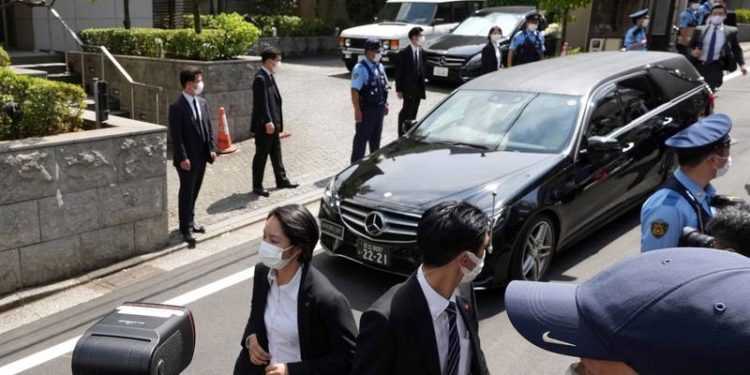 Shinzo Abe's body arrives in Tokyo as country mourns ex-PM's death