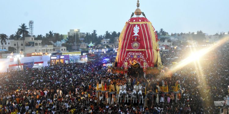 Lord Jagannath’s Nandighosa chariot being pulled towards Srigundicha temple amid a sea of devotees in Puri on the occasion of Rath Yatra, Friday