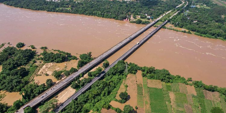 Balasore: Subarnarekha river flows over the danger mark owing to heavy monsoon rainfall at Rajghat near Jaleswar in Balasore district, Monday, Aug 22, 2022. (PTI Photo)