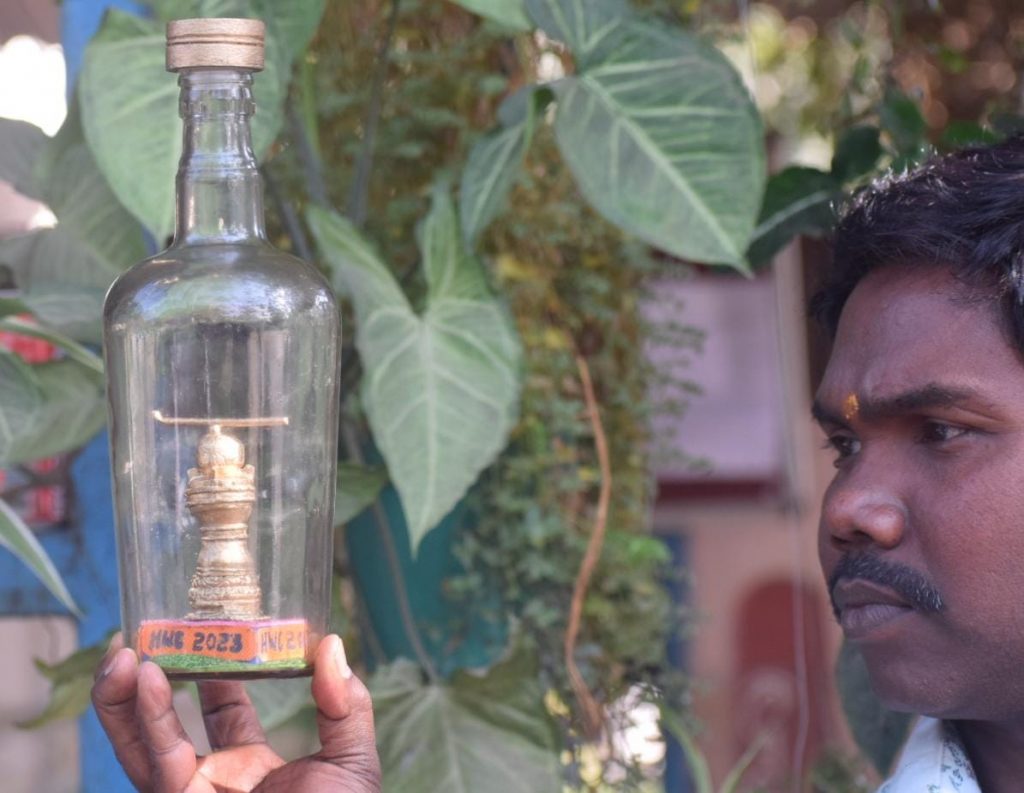 Odisha-based artist creates miniature hockey stick & ball inside a bottle