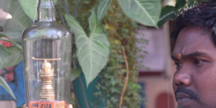 Odisha-based artist creates miniature hockey stick & ball inside a bottle