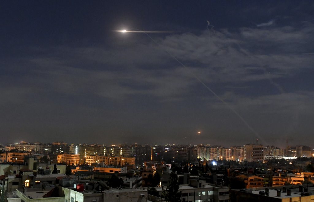 Illustrative: This photo released by the Syrian official news agency SANA shows missiles in the sky near the international airport, in Damascus, Syria, on January 21, 2019. (SANA via AP)