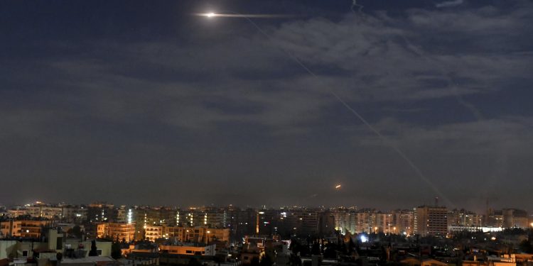 Illustrative: This photo released by the Syrian official news agency SANA shows missiles in the sky near the international airport, in Damascus, Syria, on January 21, 2019. (SANA via AP)