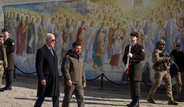 US President Joe Biden and Ukraine's President Volodymyr Zelenskiy walk next to Saint Michael’s cathedral, amid Russia's attack on Ukraine, in Kyiv, Ukraine February 20, 2023. (PC: Reuters)