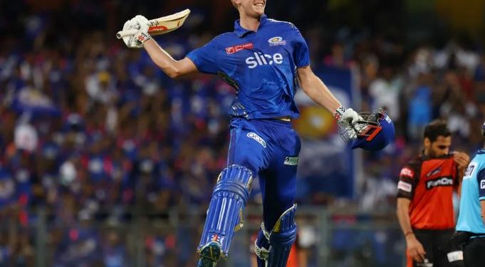 Cameron Green celebrating his maiden IPL century for MI against SRH (Image: iplt20.com)