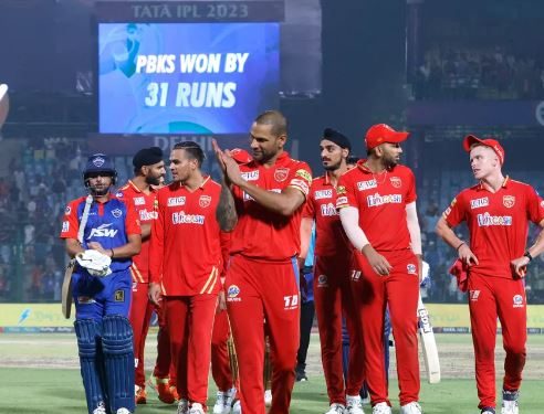 Prabhsimran, Brar fashion Punjab's 31-run win to knock out DC New Delhi: Prabhsimran Singh's magnificent maiden IPL hundred was well complemented by Harpreet Brar's four wicket haul as Punjab Kings Saturday kept their slim play-off hopes alive with a comprehensive 31-run win over Delhi Capitals, who were knocked out of contention in the process. If Prabhsimran showed tremendous resolve during his 65-ball 103 to single-handedly power PBKS to 167 for 7, Brar (4/30) and Rahul Chahar (2/16) then spun a web to strangle Delhi's chase as the home side managed just 135 for 8, despite a sizzling 27-ball 54 by skipper David Warner. The win took Punjab to 12 points from 12 games, just outside the top four but they will need to win the next two matches as well to keep hopes of a playoff, while it was the end of the road for Delhi. Earlier, while none of his batting colleagues could cross 20 runs on a sluggish pitch, Prabhsimran's perseverance paid off as he lifted Punjab from 46 for 3 to a competitive total. Warner and Phil Salt provided a flying start to Delhi's chase but the spin duo of Brar and Chahar triggered a collapse with the hosts inexplicably losing six wickets for just 19 runs to slip from 69 for no loss to 88 for 6 in 10.1 overs. Brar and Chahar were rewarded for bowling full and straight as wickets tumbled like nine pines at the Arun Jaitley stadium. If Brar saw the back of Warner, Phil Salt (21), Rilee Rossouw (5), Manish Pandey (0), Chahar picked up wickets of Mitchell Marsh (3) and Axar Patel (1) in their quota of four overs. With 66 needed off 36 balls, Aman Khan (16) and Praveen Dubey (16) tried their hands before becoming the victims of Nathan Ellis (2/21) as DC slumped to their eighth loss in 12 games to stay at the bottom with eight points. Earlier, Prabhsimran looked well in control as 10 of his hits reached the ropes, while six crossed over it during his 65-ball 103, only his second T20 hundred and first in IPL. The 22-year-old paced his innings well, scoring 27 from his first 30 balls before exploding to amass his next 76 runs from 35 balls. An aggressive approach on a slow track backfired for Punjab with the team losing three early wickets for 46 in the first six overs after DC skipper David Warner asked them to bat first. Prabhsimran and Sam Curran (20) then steadied the ship with a 72-run partnership off 54 balls. Ishant Sharma was at the forefront as he recovered from a first-ball six to remove Shikhar Dhawan (7) in the next ball with Rilee Rossouw taking the catch at deep backward square leg. Following two nine-run overs, Ishant returned to destroy the stumps of Liam Livingstone (4), who paid the price for dancing down the pitch after being away from strike for sometime with Prabhsimran producing three boundaries. Prabhsimran looked in good touch as he sent Axar Patel for a six with a reverse hit but two balls later the left-arm spinner cleaned up Jitesh Sharma (5) who looked to play an inside out shot. Kuldeep Yadav (1/32) and Praveen Dubey (1/19) kept it tight but Prabhsimran picked up the odd boundaries and rotated the strike to keep things moving for his team. The momentum shifted drastically after the 11th over when Prabhsimran blasted two successive sixes and then a four off Mitchell Marsh, milking him for 21 runs. He completed his fifty off 42 balls in the 13th over before slamming Kuldeep Yadav and Dubey into the stands for two maximums. Curran tried to join the party but he couldn't clear the ropes as Dubey picked up a wicket. However, there was no stopping Prabhsimran as he smoked Kuldeep for a six over deep square leg after a four to inch closer to his century. He achieved the milestone with back-to-back fours off Khaleel, reaching the three-digit figure in 61 balls. Prabhsimran finally was dismissed when he was looking for a scoop shot. He ended up being bowled by Mukesh Kumar. PTI IPL, Punjab Kings, Delhi Capitals