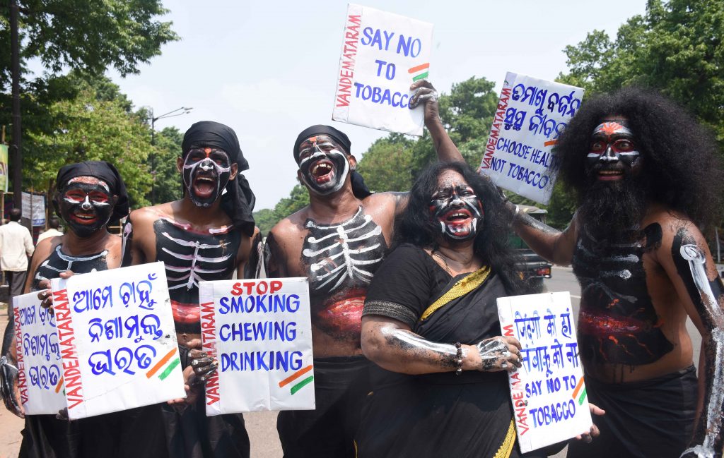 Members of social outfit Vande Mataram staged a street play at Lower PMG in Bhubaneswar, Tuesday, to spread awareness about the health hazards of tobacco consumption