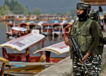 Central Reserve Police Force (CRPF) personnel stand guard on the banks of Dal Lake, a famous tourist attraction, in Srinagar ahead of G20 meet (File: Reuters)