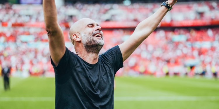 'One more to come, one more to go', says Guardiola as Man City chase historic 'treble' after FA Cup win.(photo:@ManCity)