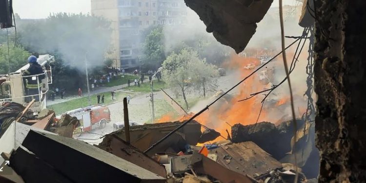 Ukraine says Russian missiles hit another apartment building; people likely trapped under rubble