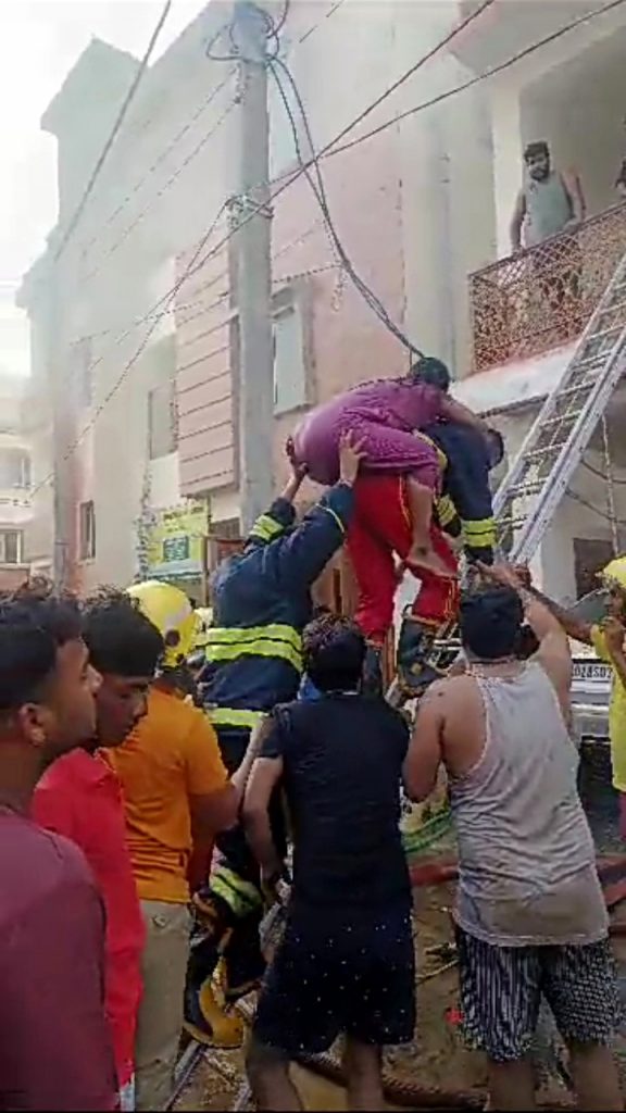 Fire service personnel rescue three people from building on fire in Bhubaneswar