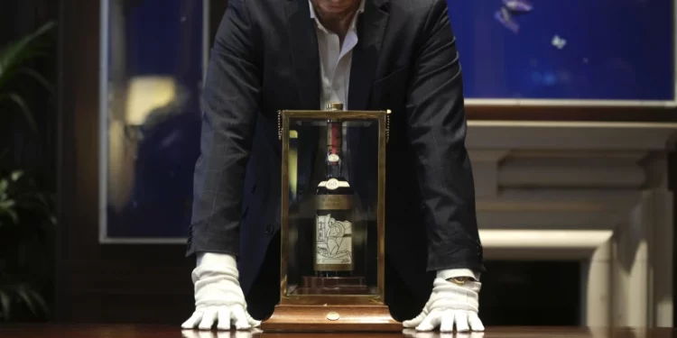 Cheers! A bottle of Scotch whisky sells for a record $2.7 million at auction