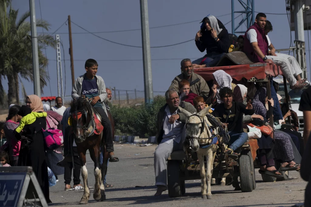 Patients and staff leave Gaza's biggest hospital, and dozens are killed at a crowded refugee camp