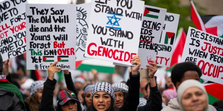 Pro-Palestinian supporters march. Nell Srinath, Daily Campus Opinion Editor, poses her opinion on the Israel-Palestine conflict. Photo by Peter Power/The Canadian Press via AP.