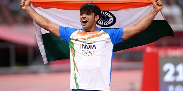 TOKYO, JAPAN - AUGUST 07: Neeraj Chopra of Team India celebrates winning the gold medal in the Men's Javelin Throw Final on day fifteen of the Tokyo 2020 Olympic Games at Olympic Stadium on August 07, 2021 in Tokyo, Japan. (Photo by Matthias Hangst/Getty Images)