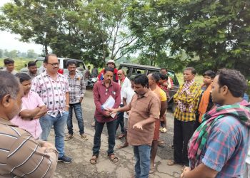 Officials from the district administration trying to pacify the agitated villagers