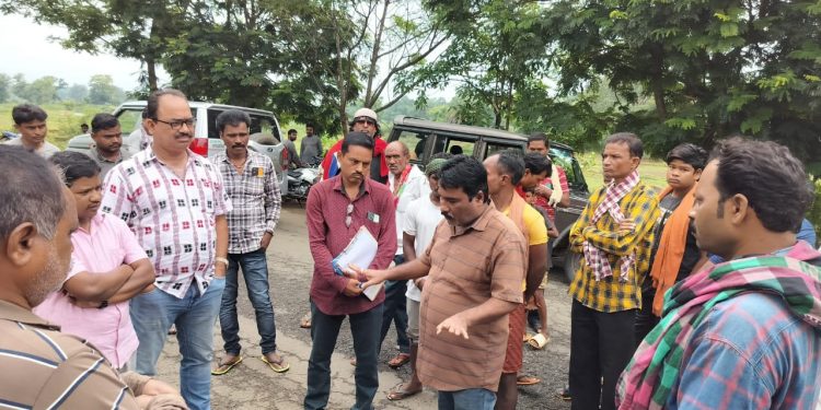 Officials from the district administration trying to pacify the agitated villagers