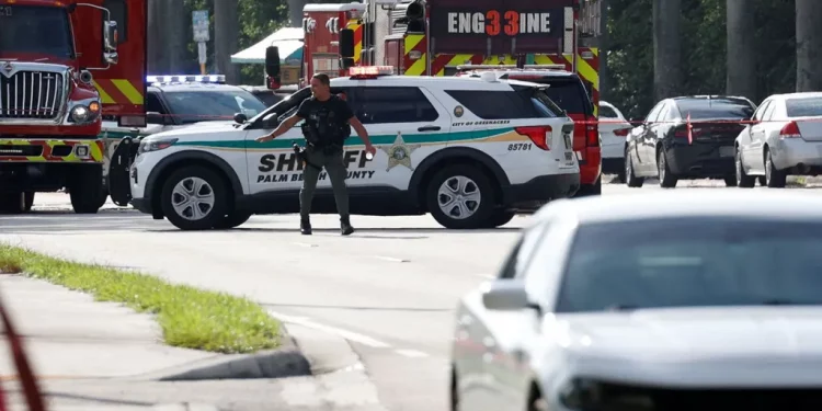 Emergency services cordoned off the area outside the Trump International Golf Club in West Palm Beach, Sunday