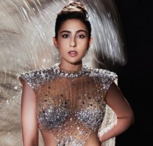 Sara Ali Khan radiates glamour in stunning golden gown, chic accessories