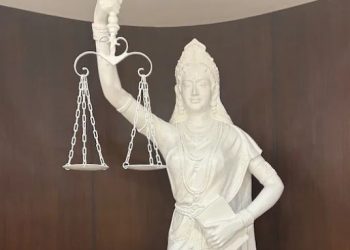 Supreme Court's Lady Justice now holds constitution, not sword; loses blindfold