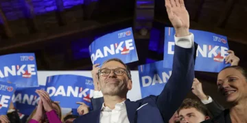 Herbert Kickl, leader of the Freedom Party of Austria waves to supporters, in Vienna, Austria, after polls closed in the country's national election. AP