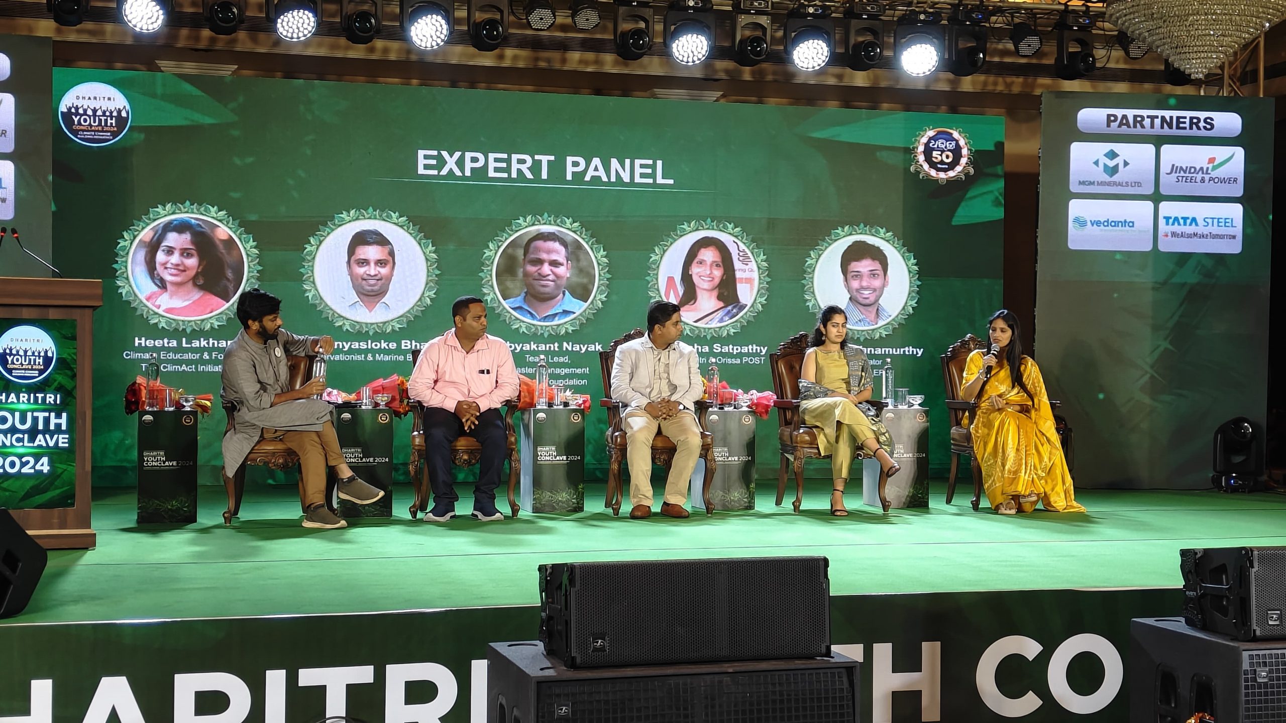 Expert panel assembles on dais to discuss ‘Climate Change: Building Resilience’. Moderating the panel is Founder of Environmentalist Foundation of India Arun Krishnamurthy. Guests on stage include Dharitri and OrissaPOST CEO Adyasha Satpathy, Founder of ClimAct and Youth Negotiators Academy Heeta Lakhani, noted Marine Biologist Dr. Punyasloke Bhadury and Team Lead for Disaster Management at Reliance Foundation Dibyakanta Nayak. 