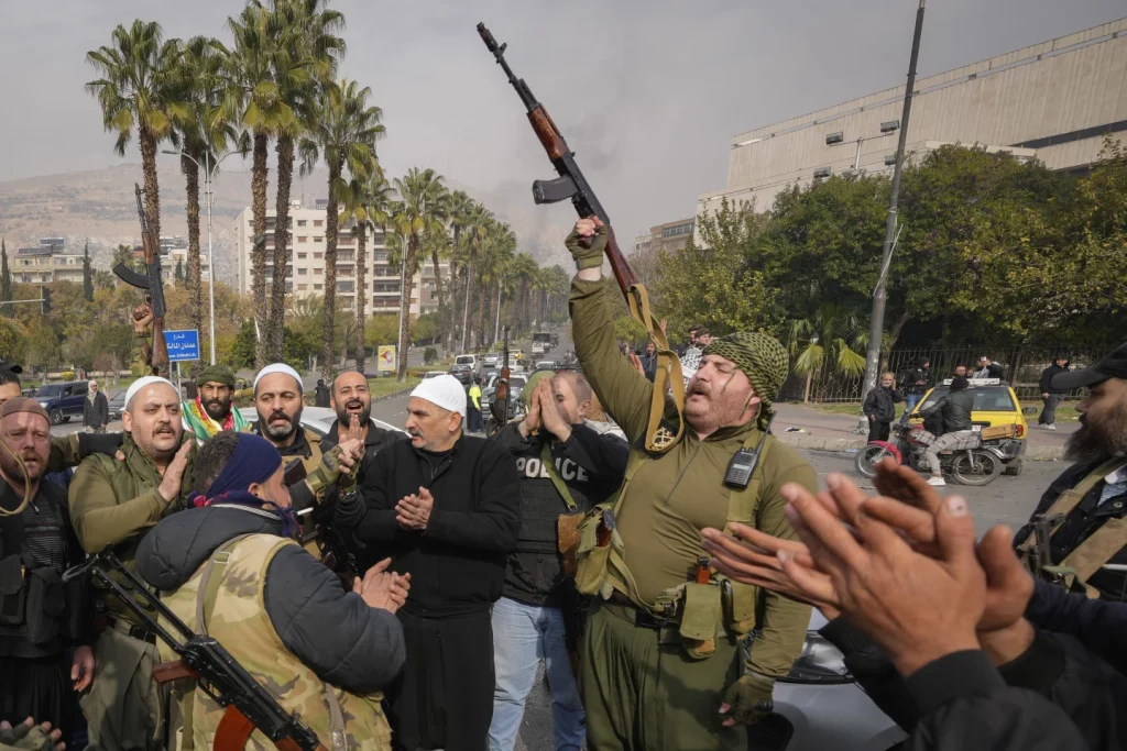 Jubilation, gunfire as Syrians celebrate end of Assad family's half-century rule