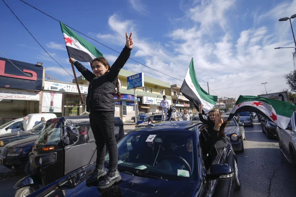 Syrians celebrate in streets as rebels reach Damascus; Russia grants asylum to Assad & family