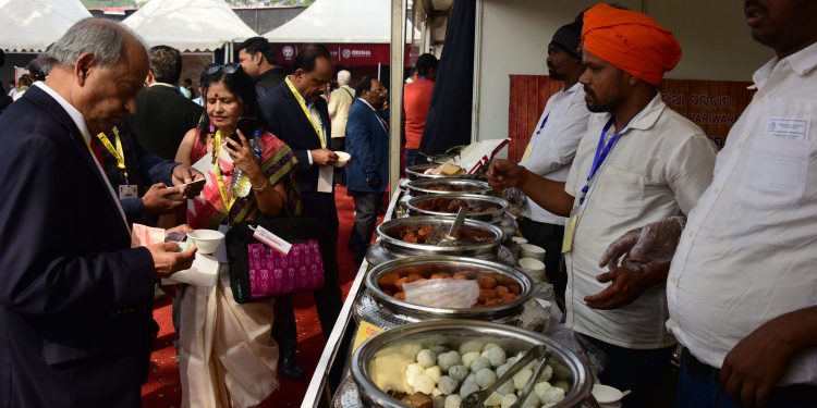 Guests from abroad lap up traditional Odia dishes at Pravasi Bharatiya Divas