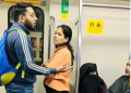 Viral Metro fight: Female passenger quarrels with man as latter hugs partner; netizens reactions to blow your mind!